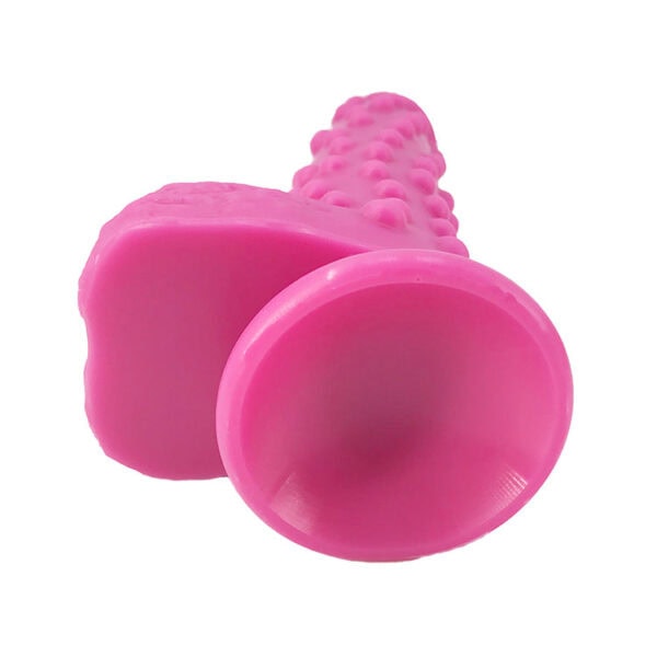 Pink silicone dildo with textured design for fantasy play